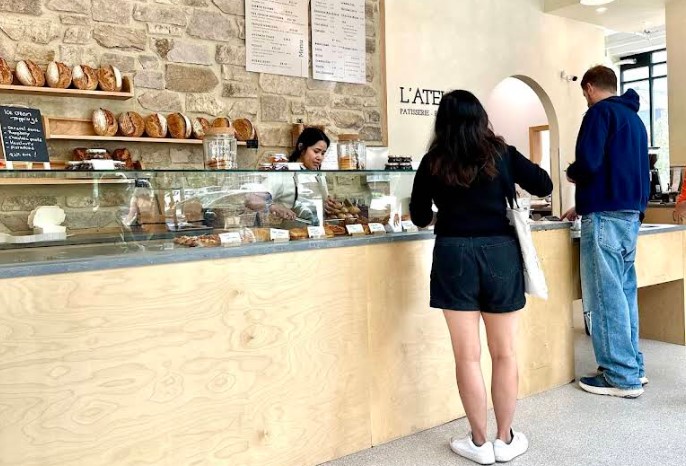Customers browse a delightful array of baked goods