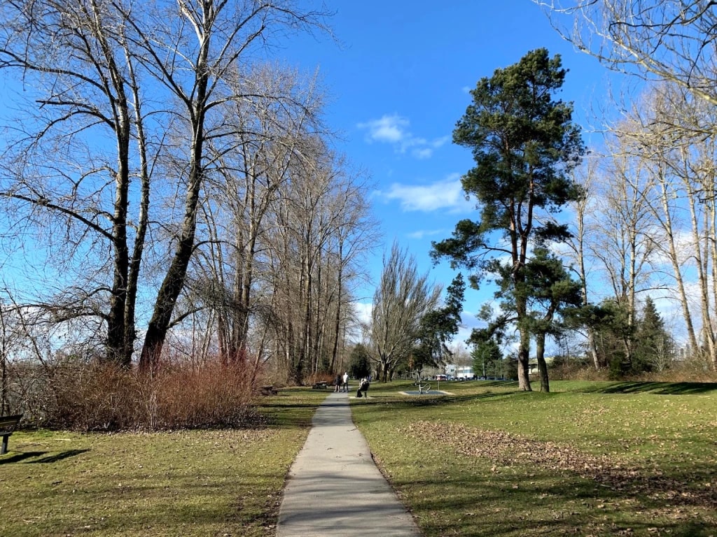 Scenic walking route on Fraser Foreshore Park Trail, one of the peaceful hikes in Metro Vancouver
