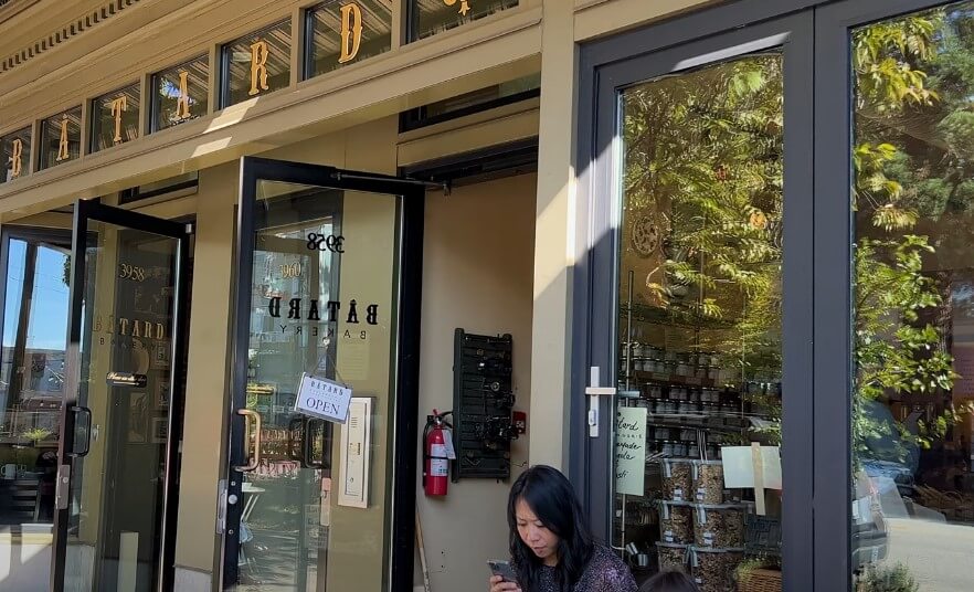 A charming bakery, Batard Bakery, welcomes customers with its open doors