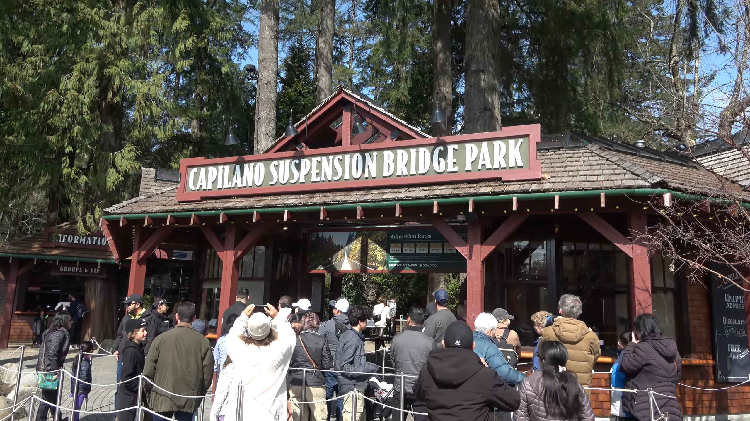 Visitors lined up at the entrance of Capilano Suspension Bridge Park in Vancouver